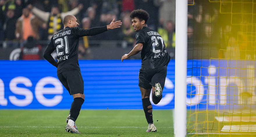 Karim Adeyemi and Donyell Malen of Borussia Dortmund celebrate a goal against Hertha BSC